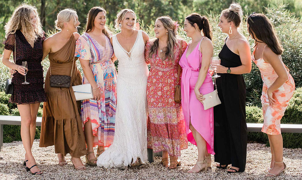 bride talking with friends at her wedding