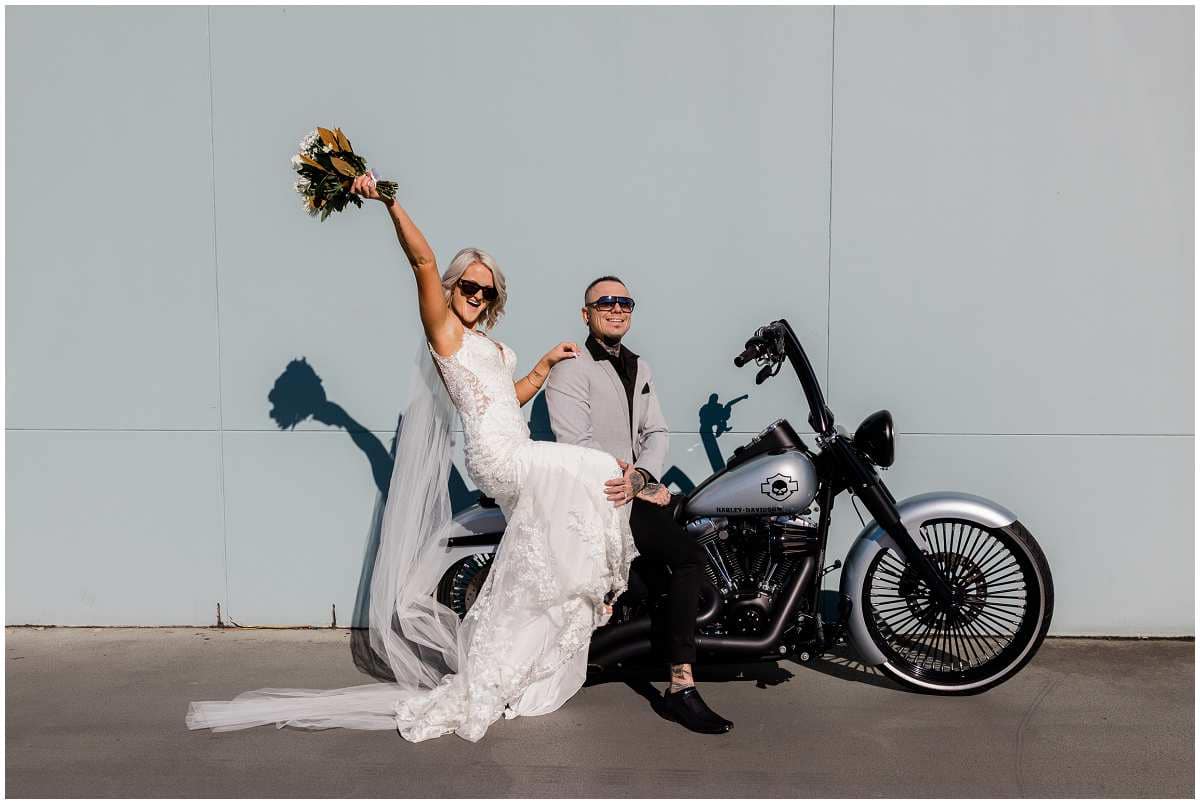 bride and groom on Harley Davidson bike