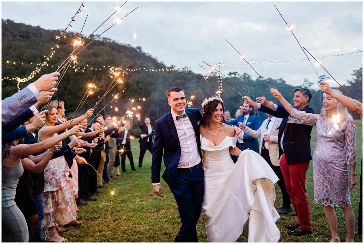 bride and groom with sparklers