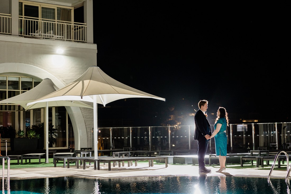 wedding at crowne plaza photo by the pool